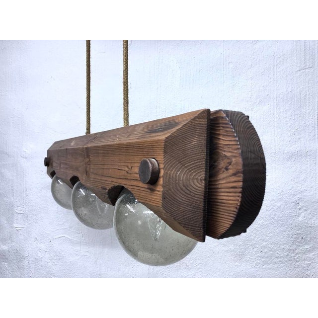 One 1970s pendant light, three-bulb, E14 socket, by Temde (label missing). We have other lights from this series...