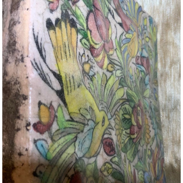 Exceptional Persian tile all hand-painted and glazed with beautiful scenery of birds flying between colorful vines and...