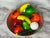 Fill a dining room or coffee table centerpiece bowl with this collection of vintage hand-blown glass fruit for a colorful...