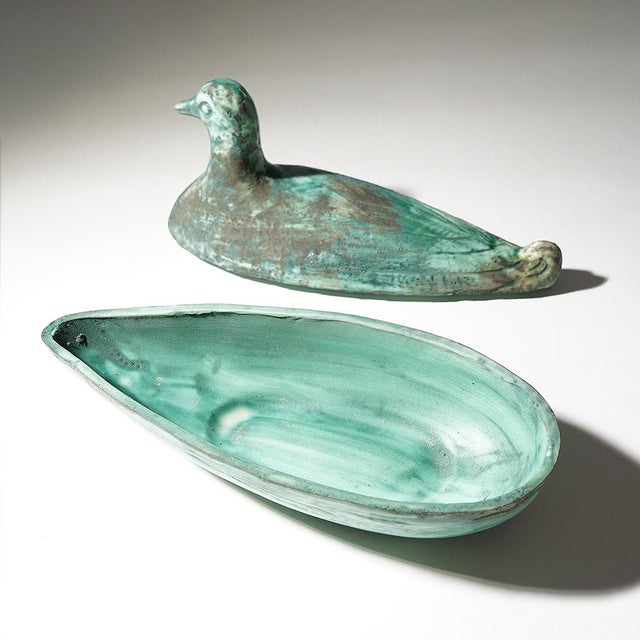 Ceramic bird-shaped box produced in the 1960s, featuring a refined sculptural presence and a beautifully textured surface....
