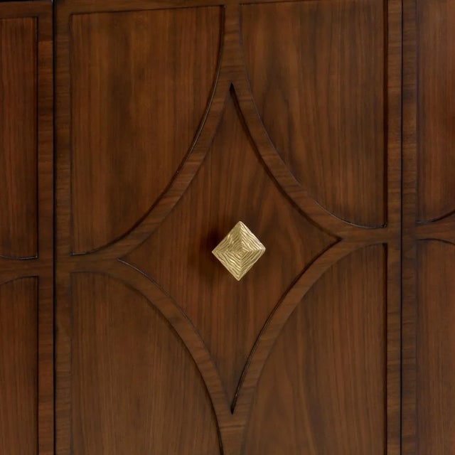 Walnut veneer mid-century sideboard with four diamond motif doors and eight adjustable shelves. Not intended for clothes...