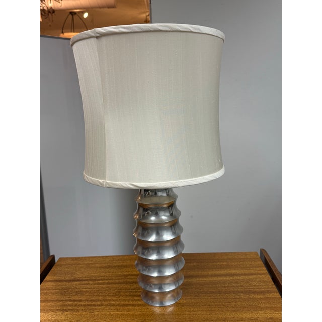 Design Plus Gallery presents a Vintage Sculptural Table Lamp from Nambé Lighting, produced by Stonegate Designs. The...