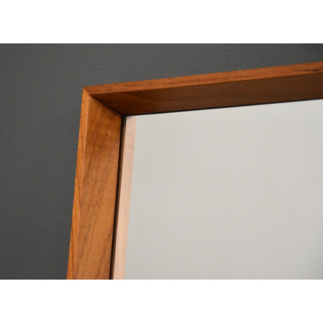 A mid century modern teak rectangular mirror. Made in Denmark. Circa 1960’s. Unmarked.