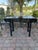 Chinese Black Lacquered Mahogany Console Table This elegant Chinese console table is crafted from solid mahogany and...