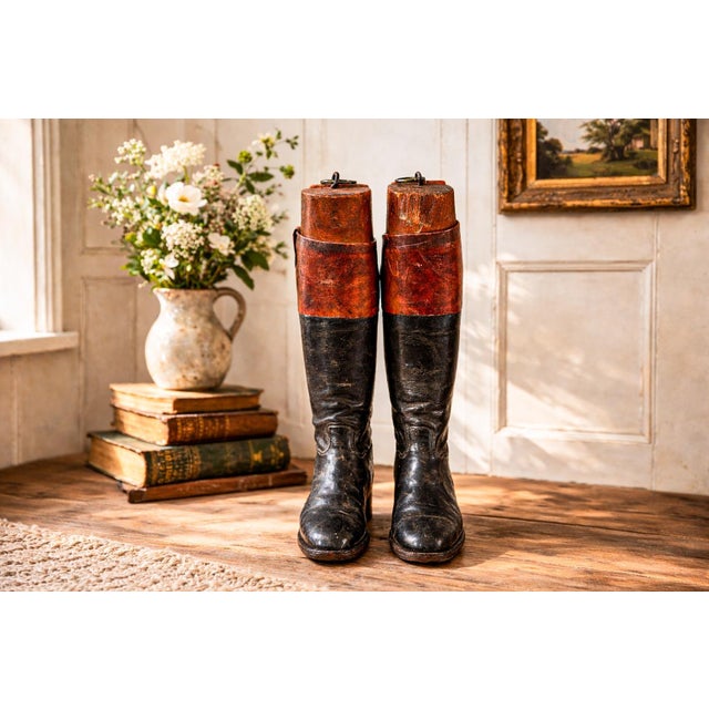 A wonderfully evocative pair of late 19th-century riding boots, complete with their original solid wood boot trees,...