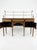 A fine 19th century mahogany sideboard of elegant inverted breakfront form, surmounted by a decorative brass gallery with...