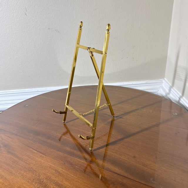 Beautiful heavy brass miniature easel no broken or missing pieces. Good look and very stable