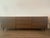 BoConcept Sideboard Dimensions: 90 3/4" W x 19 " D x 29" H Material: Dark Oak Veneer Legs: Matt Black Structured Lacquered...