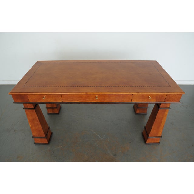 Vintage and beautifully tailored in the Biedermeier style, this Hickory White writing desk doubles as an elegant library...