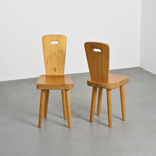 Pair of chairs by Christian Durupt, a French cabinetmaker who notably worked with Charlotte Perriand. Made of solid pine,...