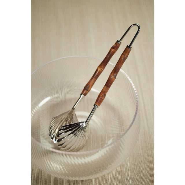 Bring undersea treasures to your table with our Treviso Server Tong. The lovely bamboo handle and the shell-inspired heads...