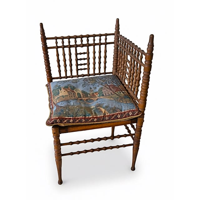 This item is an antique Victorian bobbin-turned corner chair (also frequently called a spool-turned or spindle corner...