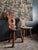 Late 19th century French fireplace chair from Lorraine, handcrafted from solid beechwood. With its warm natural patina,...