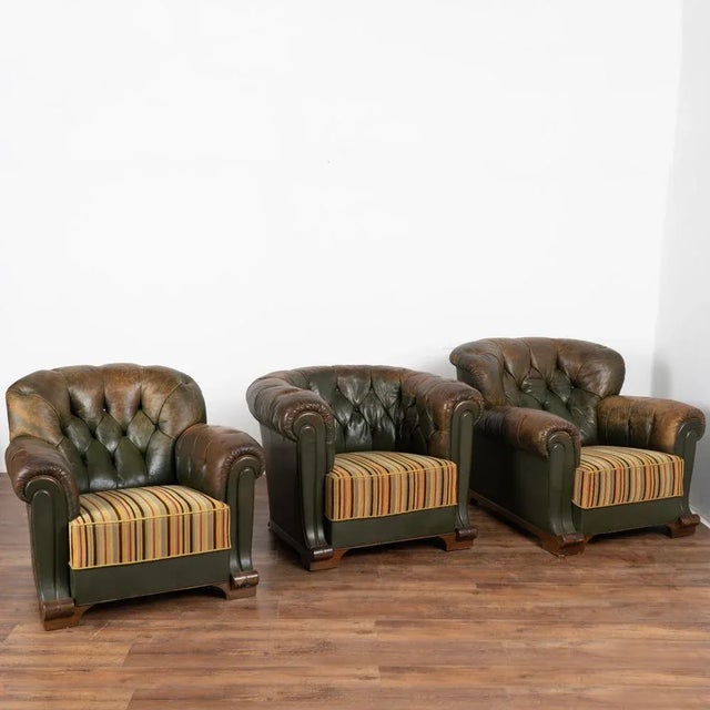 Set (4) vintage leather Chesterfield style sofa with heavily rolled arms, pair of arm chairs and additional barrel chair...