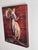 This oil painting on wood presents a majestic ram, poised confidently against a rich, textured background that echoes the...