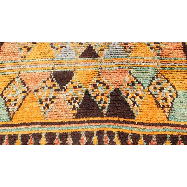 Mid 20th Century Long Vintage Moroccan Runner With Tribal Design in Orange, Brown, Blue and Green For Sale - Image 10 of 13