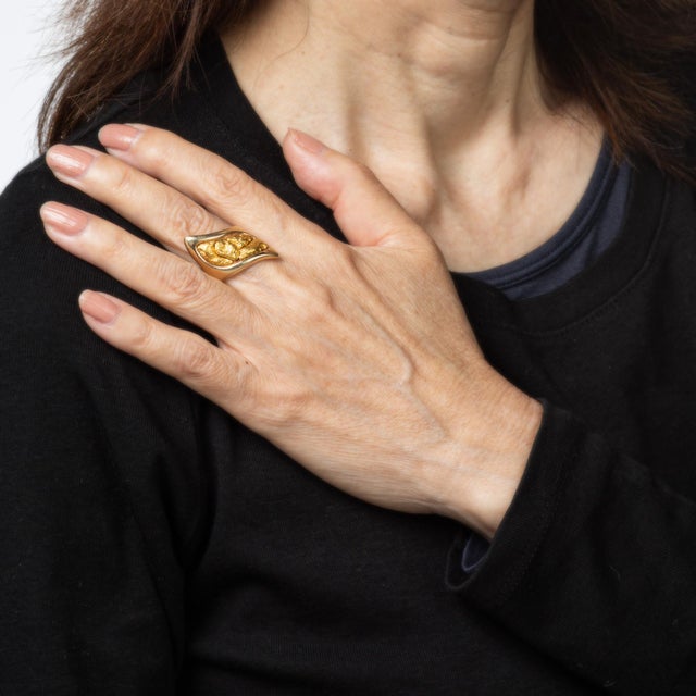 Stylish contemporary nugget ring crafted in 14 karat yellow gold, set with natural gold nuggets. Four large natural gold...