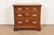 A beautiful Georgian or Chippendale style nightstand or bachelor chest of drawers By Baker Furniture USA, Circa 1980s...
