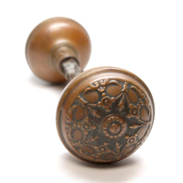 This Victorian five fold dark patina brass entry door knobs were made by Reading in the 1895 catalog. It is part of the...