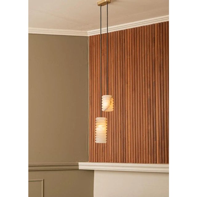 Maniko fluta duoble white alabaster pendant lamp by simone & marcel dimensions: d 10 x w 25 x h 150 cm. Materials:...