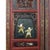 Five panel Qing dynasty screen, each panel of which features several lacquered wooden tiles decorated with imagery either...