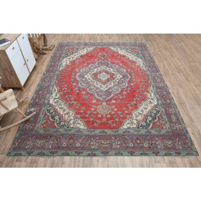 Vintage Persian Hand-Knotted vintage rug is a semi-antique vintage area rug. The '70s Eastern region of Turkey's unique...