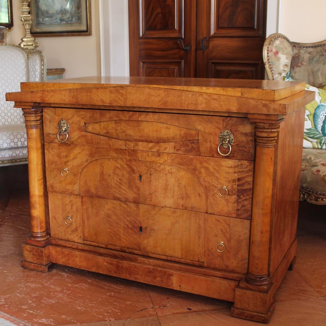 A stylish Biedermeier commode with a pedimented front and recessed panels enlivening the front profile. Free standing...