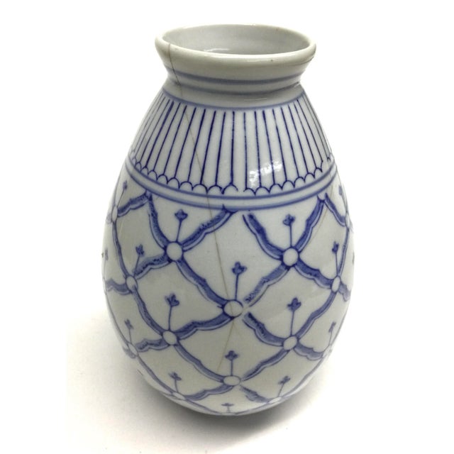 Purchased from an antique shop in Phuket and packed away for decades, this little vase will work well in any interior...