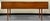 Solid American black cherry drop leaf harvest dining table made by Henkel Harris. Simple elegance with finely tapered legs...