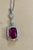 This spectacular Pendant Necklace is a true masterpiece, consisting of a single Cushion Shape Rubelite that weighs an...