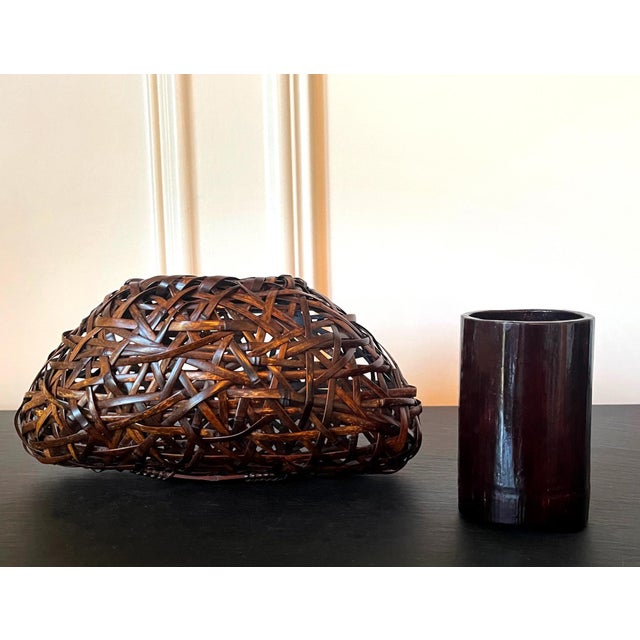 A Japanese woken bamboo Hanakago, a wall hanging Ikebana basket by Suemura Shobun (1917-2000). The basket is entitled...