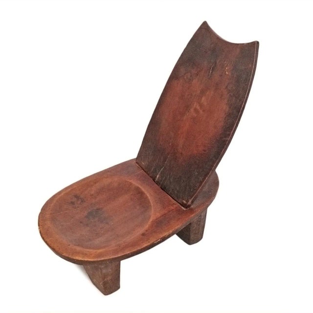 Rare vintage Ethiopian carved wood slat back chair. Seat height is 10". Comes apart in two pieces for easy assembly and...