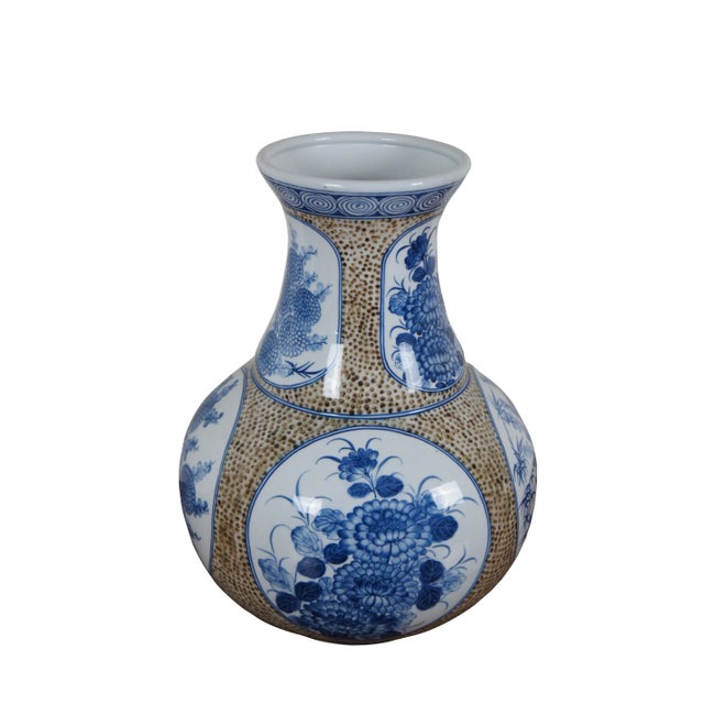 Late 20th century porcelain vase / urn by Maitland Smith. Features round panels of chinoiserie floral designs, framed in a...