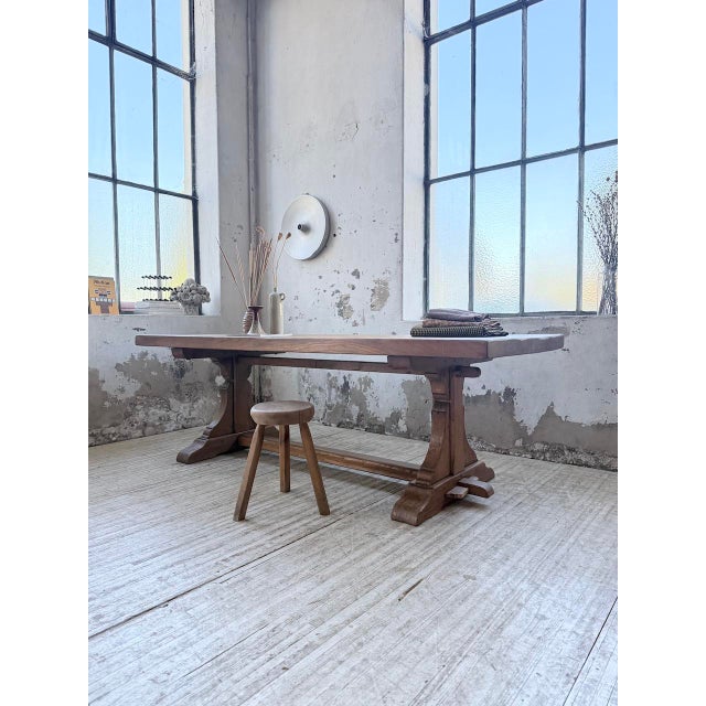 Antique farmhouse or monastery table in solid oak, with its very thick top and typical country-style legs. We love the...