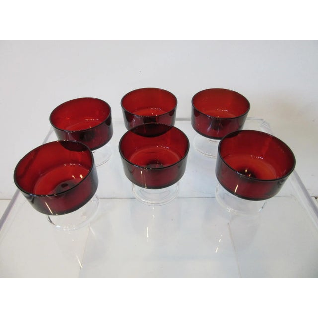 A set of six deep ruby red clear stemmed dessert glasses made and marked France, these are perfect for that dinner party...