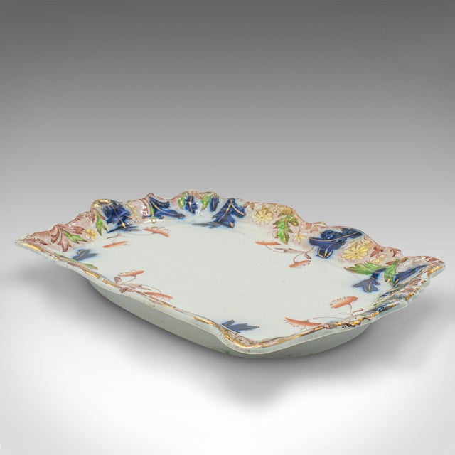 This is an antique decorative cheese keeper. An English, ceramic kitchen butter dish, dating to the Victorian period,...