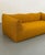 Mario Bellini's Le Bambole arrived in 1972 like a dare: what if a sofa were just a pillow, blown up to room scale, with...