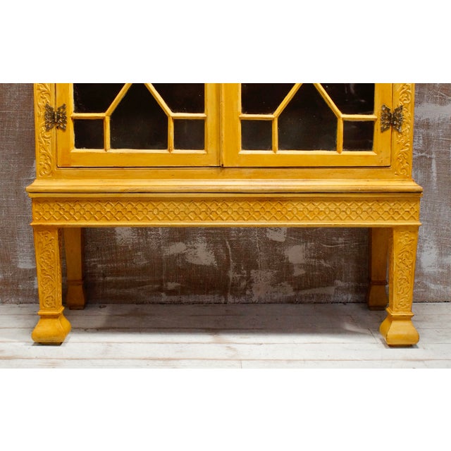 Regency Ochre Astral Glaze Display Cabinet. Made from pine, this beautiful cabinet features an intricately carved design...