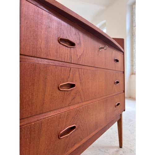 This Danish-made secretary desk is a masterful example of the functional elegance of the mid-century era. Crafted from...