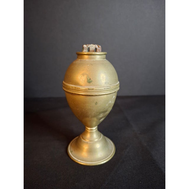 Up for sale is a authentic 19th-century spun brass standalone fluid/lard lamp, dating to circa 1840s–1850s. Standing...
