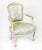 This is a beautiful antique pair of Louis Revival French shabby chic cream painted fauteuils, or open armchairs, late 19th...