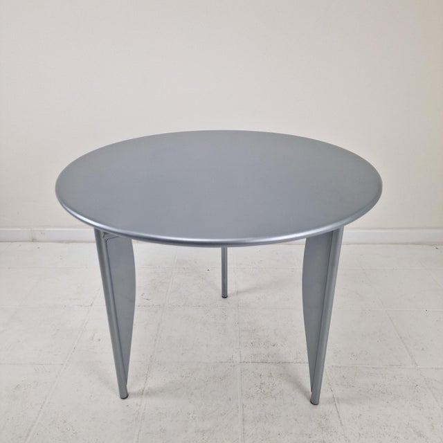 A rare and highly collectible masterwork of postmodern design, this authentic "Titos Apostos" table was designed by the...