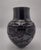 A magnificent hand-coiled Santa Clara Pueblo blackware vase by acclaimed Pueblo potter Sherry Tafoya, beautifully executed...