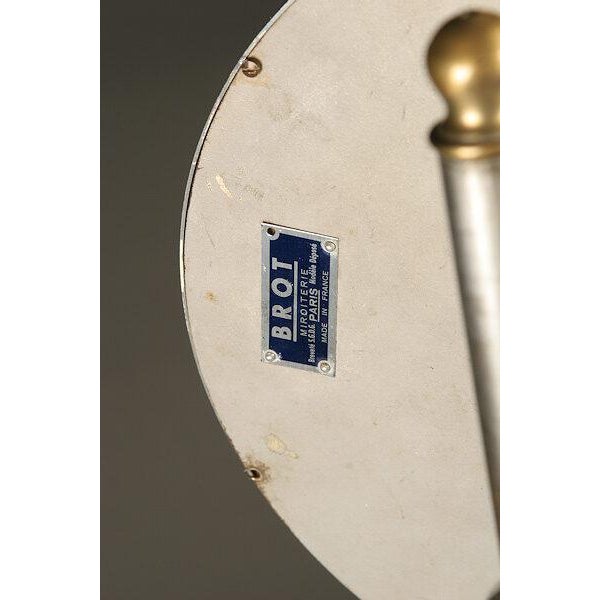 Stylish French Art Deco period shaving mirror dating to circa 1920, featuring a nickel-silver finish and an adjustable-...