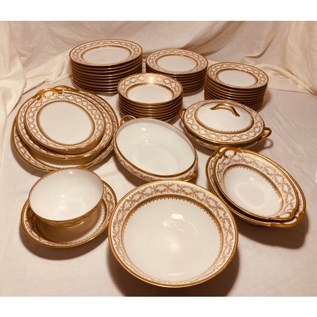 Gold & White porcelain dinner ware set Limoges Havilland created for retailer Titche Goettinger in early 20th century in...
