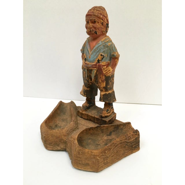 Pure pirate charm. Hand carved wood pipe holder imported from Germany. The pirate character has amazing carved and hand...