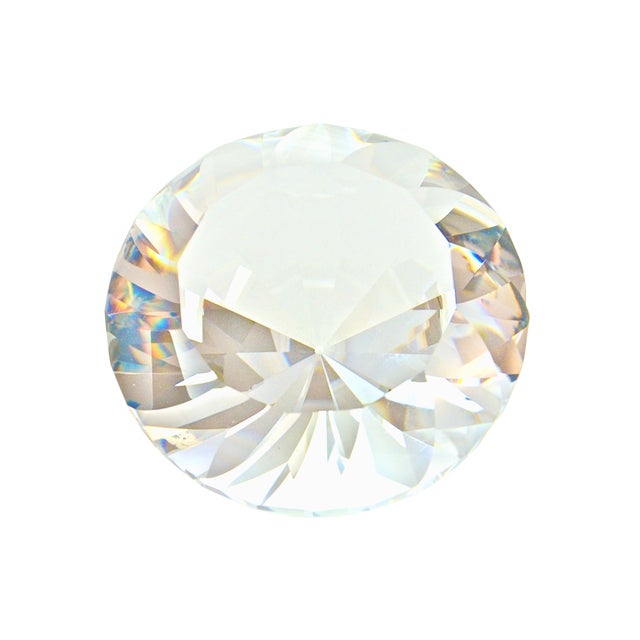 Large faceted diamond shape sparkling crystal. Feels wonderfully substantial as well as cool and smooth to the touch. Adds...