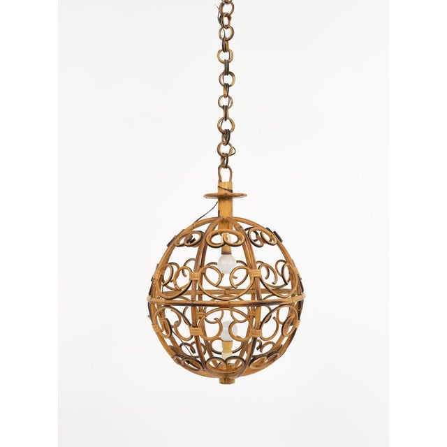 Midcentury beautiful chandelier ball shaped. Made in Italy in the 1960s. This suspension lamp is entirely handcrafted with...