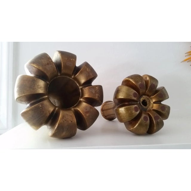 Set of 2 unique mid-century decorate objects/vases made of plaster and painted a rich, gesso gold. Fluted exterior with a...