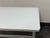Design Plus Gallery presents a Geller Adjustable Height Desk from Tresanti. The desk pairs a white rectangular glass top...